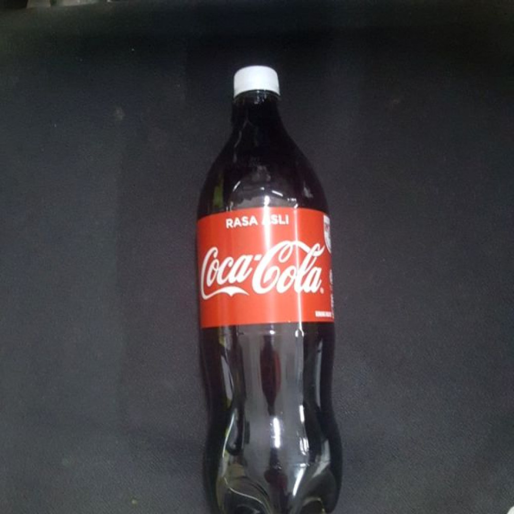 coca cola rasa asli 1.25l coca cola rasa asli 1.25l